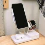Điện thoại iPhone, AirPods và Apple Watch sạc trên đế sạc không dây ESR 6 trong 1 với công nghệ Qi2.