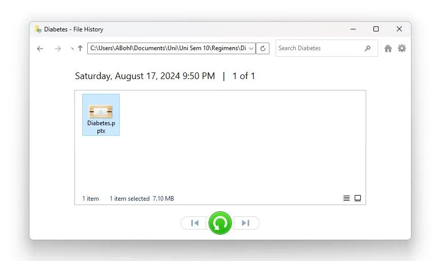 Giao diện công cụ Lịch Sử Tệp (File History) khi khôi phục một tệp PowerPoint trên Windows
