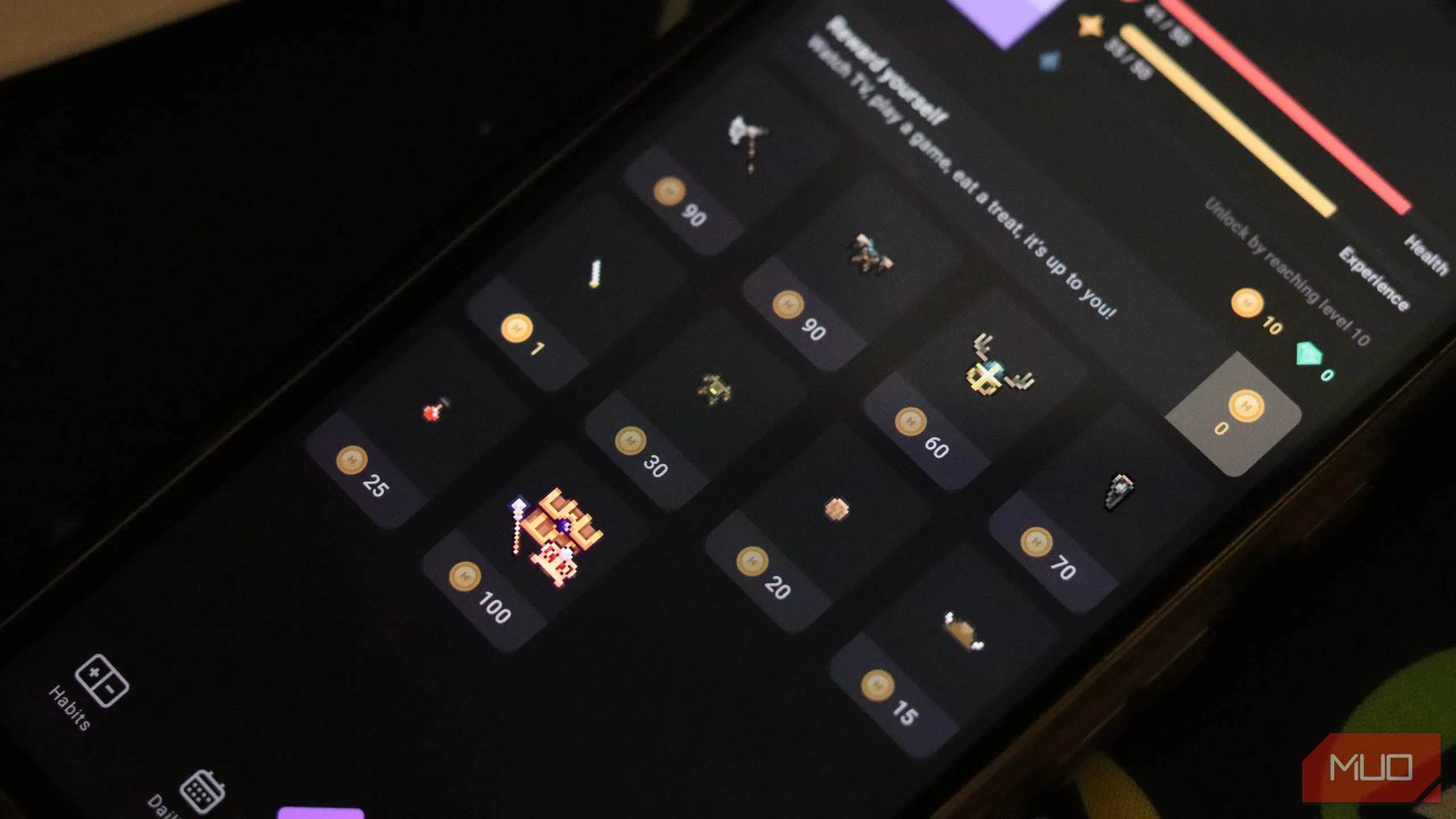 Giao diện mua vật phẩm bằng tiền ảo (gems) trong ứng dụng Habitica, minh họa cơ chế microtransactions