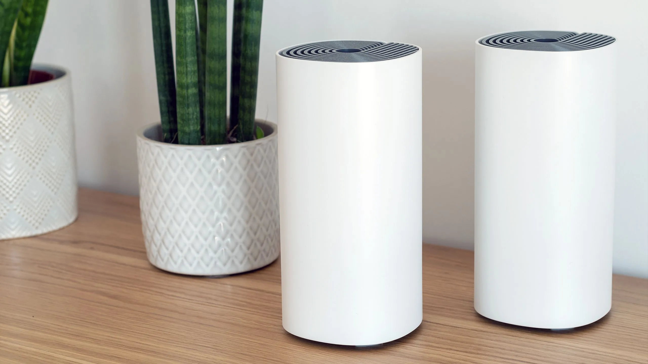 Hệ thống nhiều router Mesh Wi-Fi hoạt động cùng nhau để mở rộng vùng phủ sóng liền mạch