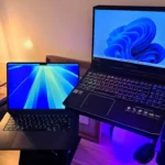 Laptop Windows 11 và macOS đặt cạnh nhau, minh họa tốc độ khởi động nhanh