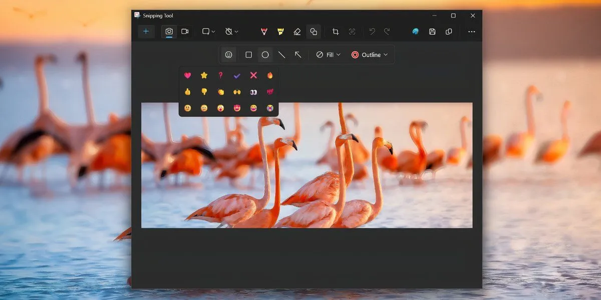 Menu lựa chọn biểu tượng cảm xúc (emojis) trong tùy chọn Hình khối (Shapes) của Snipping Tool trên Windows 11.