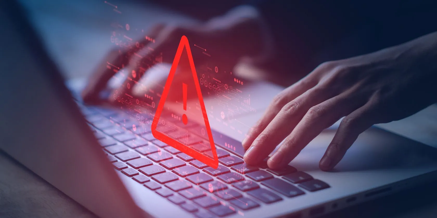 Người dùng làm việc với laptop hiển thị cảnh báo bảo mật, nhấn mạnh nguy cơ bị đoán các câu trả lời bảo mật phổ biến