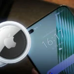 Thiết bị định vị Apple AirTag cùng với điện thoại thông minh Android biểu tượng cho khả năng theo dõi vị trí và tính năng chống theo dõi mới của Google