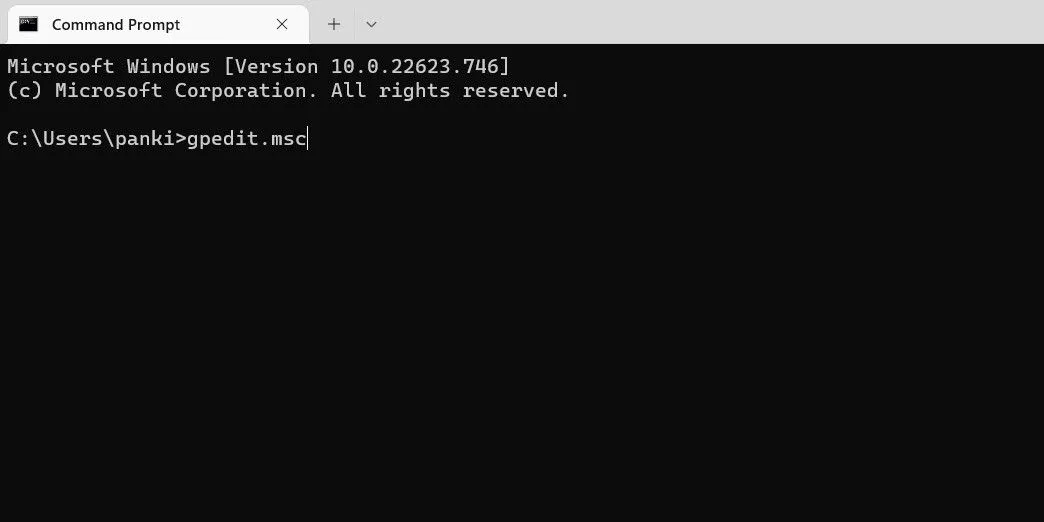Truy cập gpedit.msc qua Command Prompt hoặc PowerShell